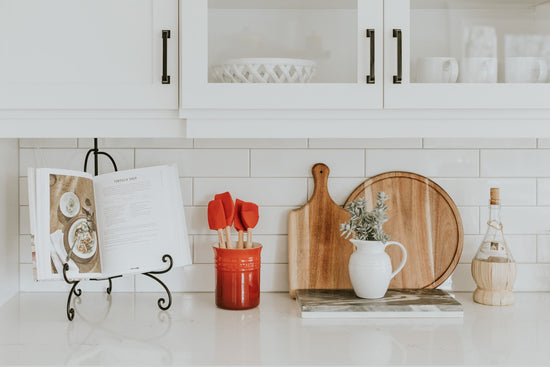 French kitchen essentials: porcelain, French baskets, French canisters and French pots.