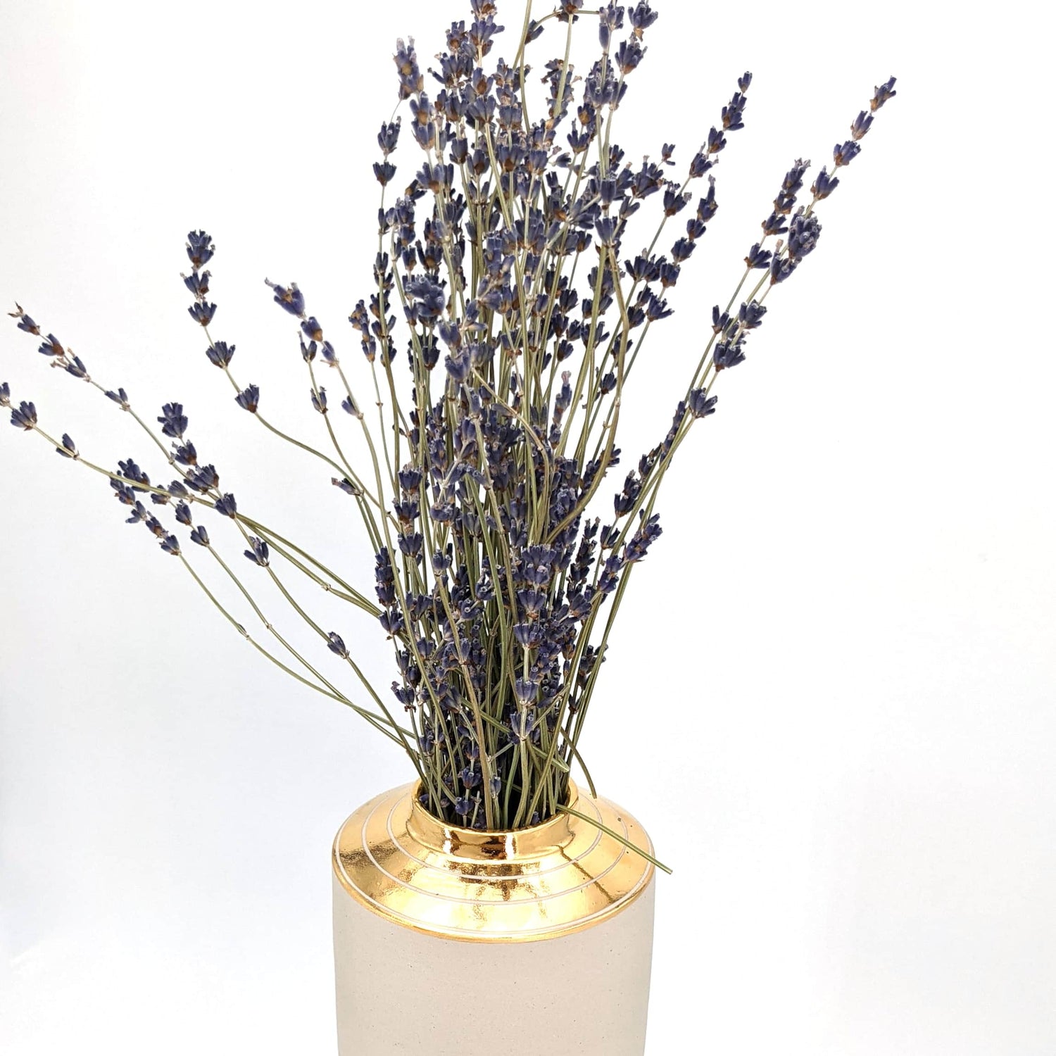 Lavender Flowers in Golden Vase
